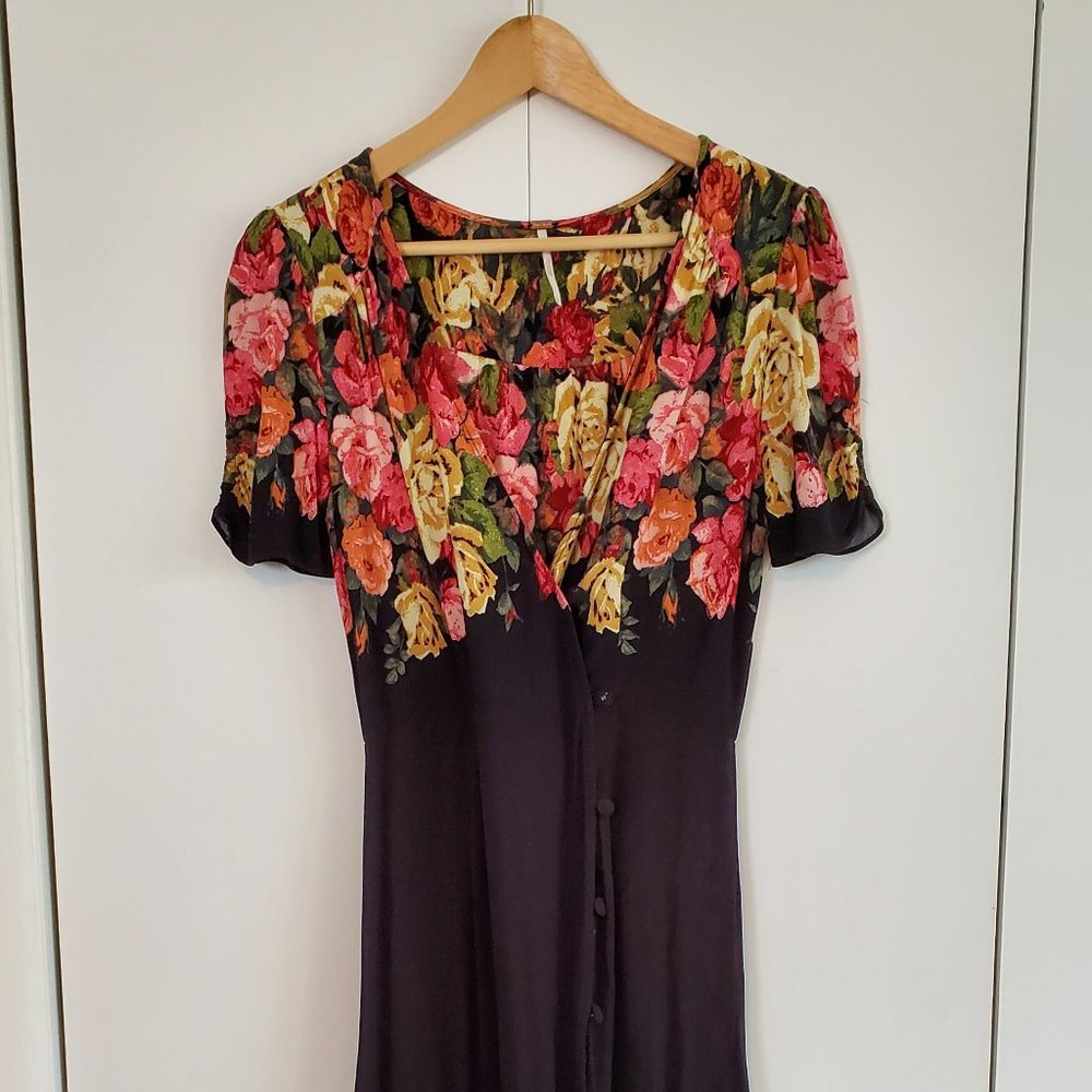Free People black and floral midi wrap dress in size small